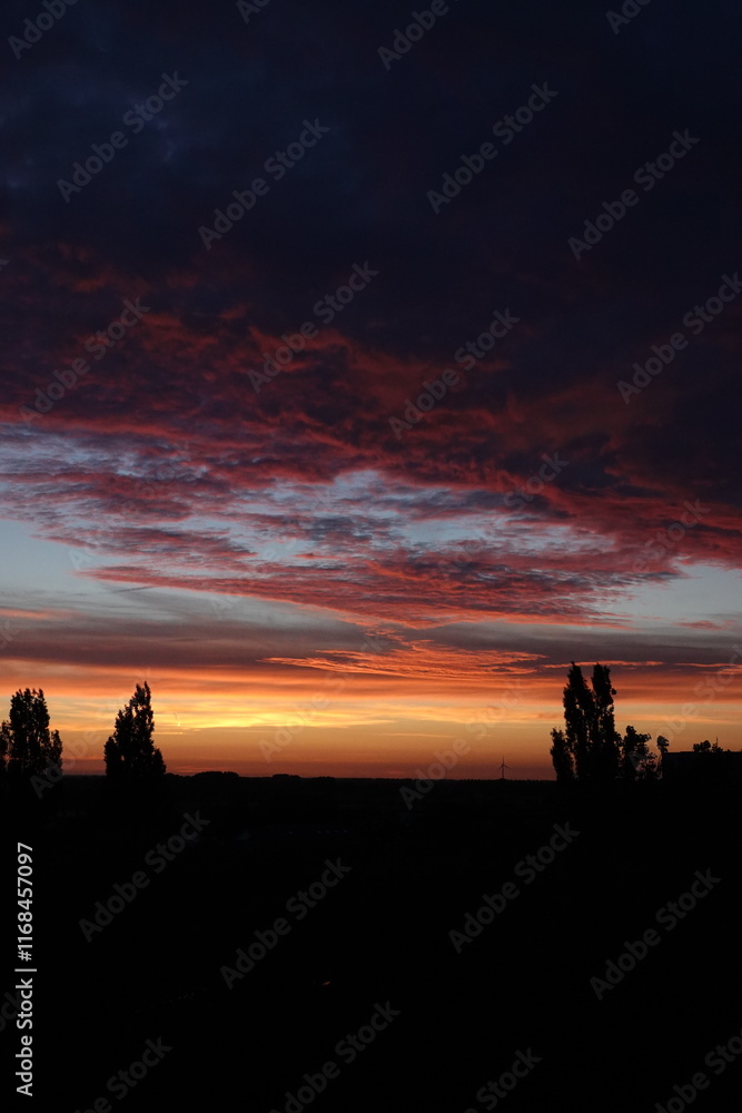 Fototapeta premium Orange sunset and clouds