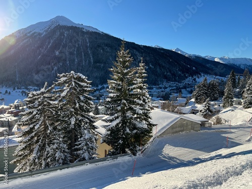 A fairytale winter atmosphere and a magnificent panorama on the mountine Swiss tourist resort of Davos - Canton of Grisons, Switzerland (Kanton Graubünden, Schweiz) photo