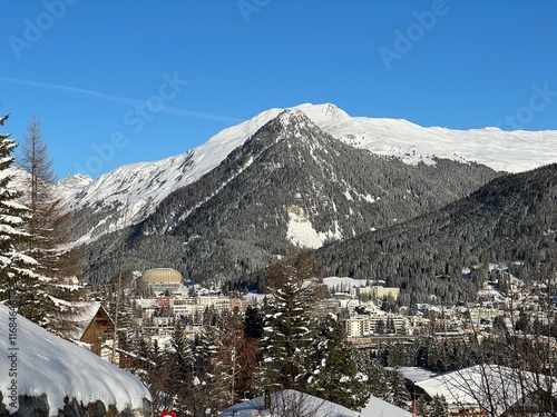 A fairytale winter atmosphere and a magnificent panorama on the mountine Swiss tourist resort of Davos - Canton of Grisons, Switzerland (Kanton Graubünden, Schweiz) photo