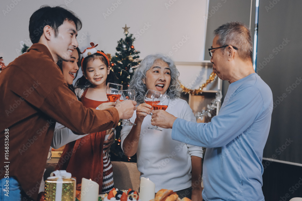Merry Christmas! Happy family are having dinner at home. Celebration holiday and togetherness near tree.
