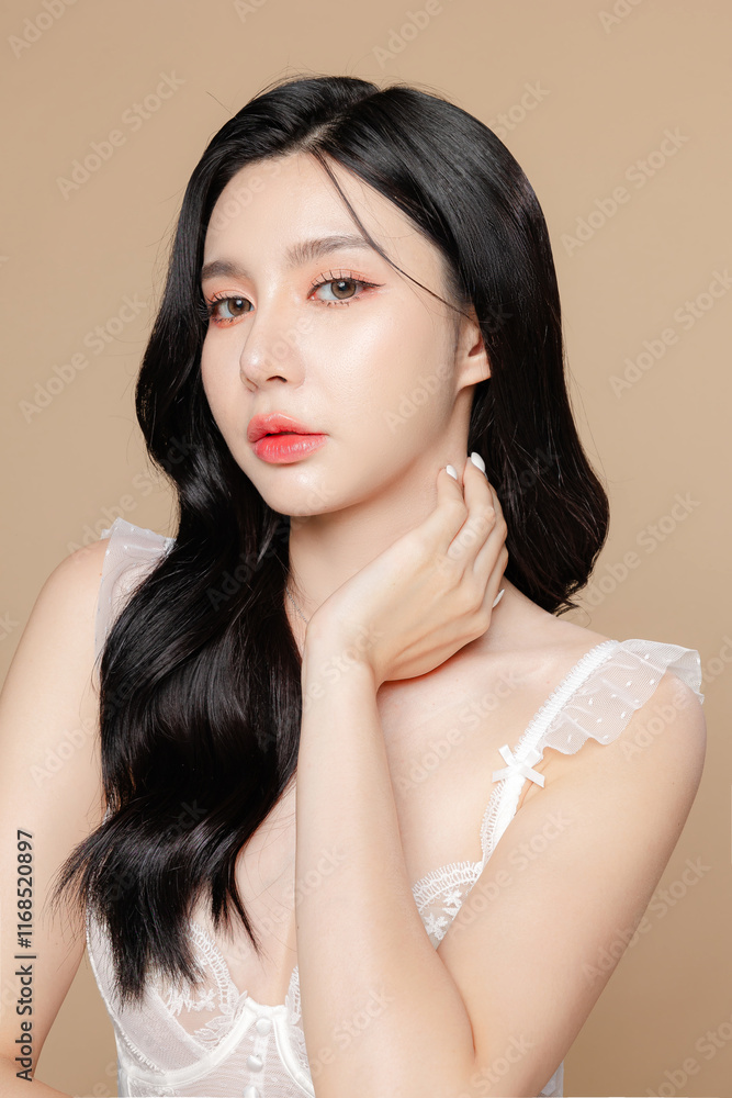 Fototapeta premium Young Asian beauty woman long hair in white lingerie with korean makeup style on face and perfect skin on isolated beige background. Facial treatment, Cosmetology, plastic surgery.