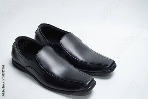 Black pantofel shoes isolated on white background