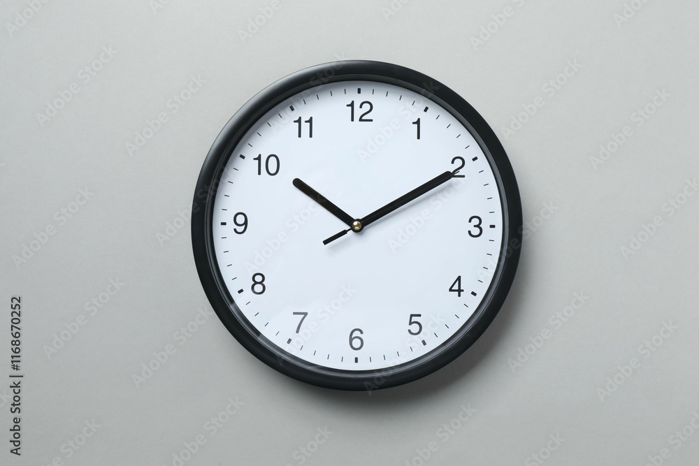 Big beautiful stylish clock on gray background Big beautiful stylish clock on gray background