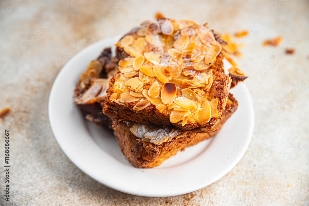 Brioche sweet almond french toast fresh tasty food dish delicious gourmet food background on the table rustic food top view copy space Brioche sweet almond french toast fresh tasty food dish delicious gourmet food background on the table rustic food top view copy space