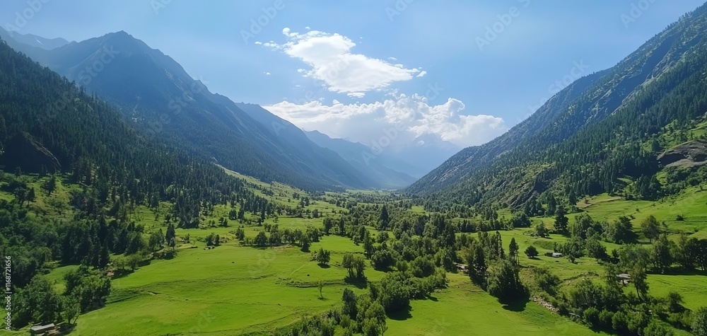 Fototapeta premium Serene mountain valley landscape. Lush green meadows nestled between towering peaks under a vibrant blue sky. Ideal for travel, nature, and tourism.