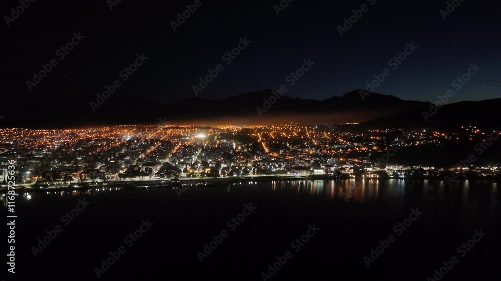 Drone shot of Bariloche city in Argenita during the night Drone shot of Bariloche city in Argenita during the night