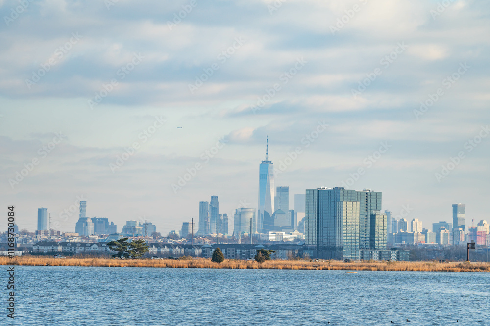 Manhattan skyscrapers skyline, cold winter day blue sky, travel destination background image, selective focus isolated subject, photo taken from New Jersey far away skyscrapers, background image Manhattan skyscrapers skyline, cold winter day blue sky, travel destination background image, selective focus isolated subject, photo taken from New Jersey far away skyscrapers, background image
