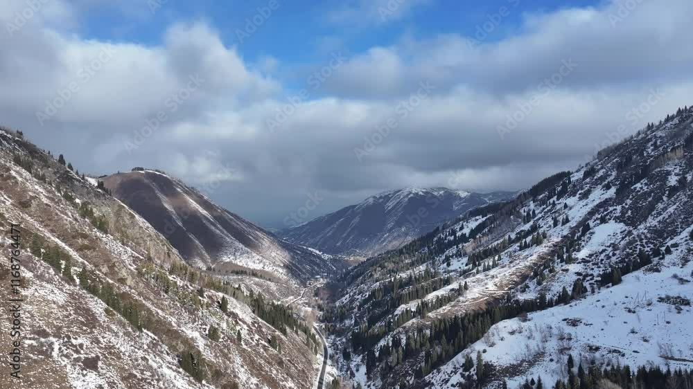 Picturesque gorge in the Trans-Ili Alatau mountains near the Kazakh city of Almaty on a cloudy winter day Picturesque gorge in the Trans-Ili Alatau mountains near the Kazakh city of Almaty on a cloudy winter day