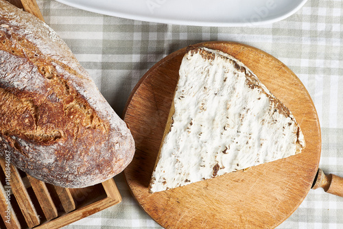 French black Brie cheese. This is a very old speciality from the Meaux region of the Ile-de-France region. It is the famous Brie de Meaux but with a much longer maturation. 