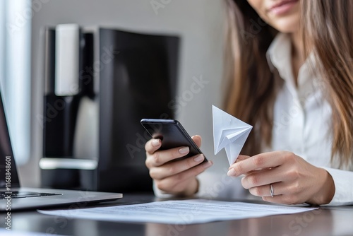 Procrastinating woman at her desk. Freelancer handles tasks from her home office. Tired and unmotivated woman shuffles paper around. Reluctant office worker photo