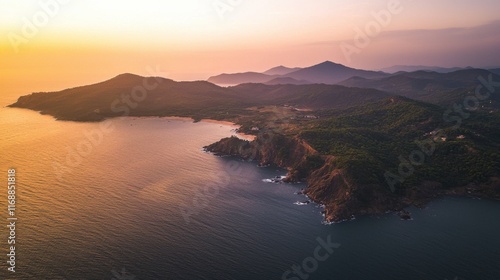 an aerial photography of sea and huge montains, late dusk, cold, realistic, huge, natual light, photo