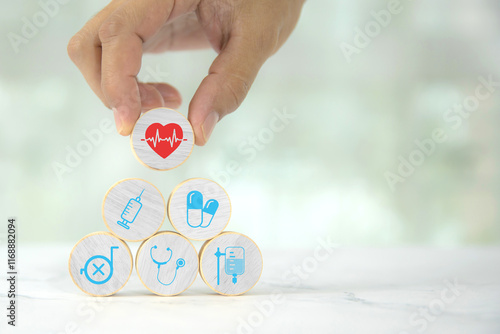 Hand chooses wooden toy stack with wellness medical care and healthy for family safety insurance plan or personnel sickness illness treatment concept.