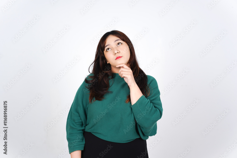 Thinking and Curious gesture Of Beautiful Asian Woman wearing green Isolated On White Background Thinking and Curious gesture Of Beautiful Asian Woman wearing green Isolated On White Background