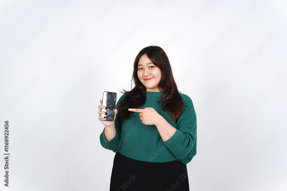Smiling presenting and holding blank screen smartphone for ad or apps Of Beautiful Asian Woman wearing green Isolated On White Background Smiling presenting and holding blank screen smartphone for ad or apps Of Beautiful Asian Woman wearing green Isolated On White Background