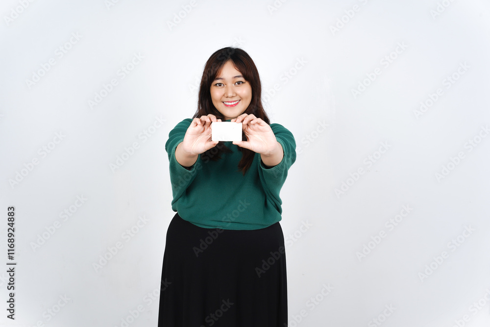 Holding Credit Debit Card, Smiling and showing white blank card, Pay or Shopping Concept Of Beautiful Asian Woman wearing green Isolated On White Background Holding Credit Debit Card, Smiling and showing white blank card, Pay or Shopping Concept Of Beautiful Asian Woman wearing green Isolated On White Background
