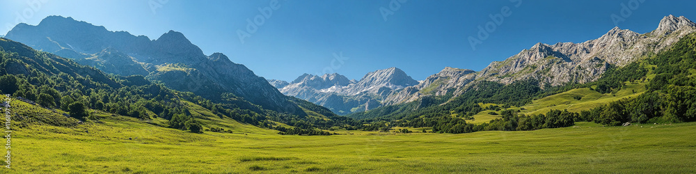Verdant pastures amidst rugged mountain scenery and a clear, bright sky Verdant pastures amidst rugged mountain scenery and a clear, bright sky