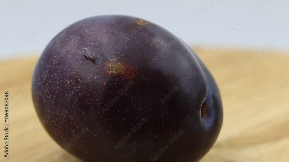 Detailed view of a plum rotating. Great for fresh and nutritious meals. Detailed view of a plum rotating. Great for fresh and nutritious meals.