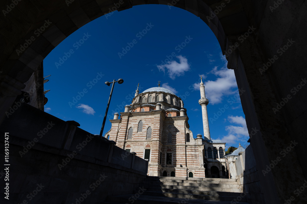 Laleli Mosque also known a Tulip mosque. Exterior shot. Arabic text as decor (verses from Koran, muslim Holy book). Ottoman