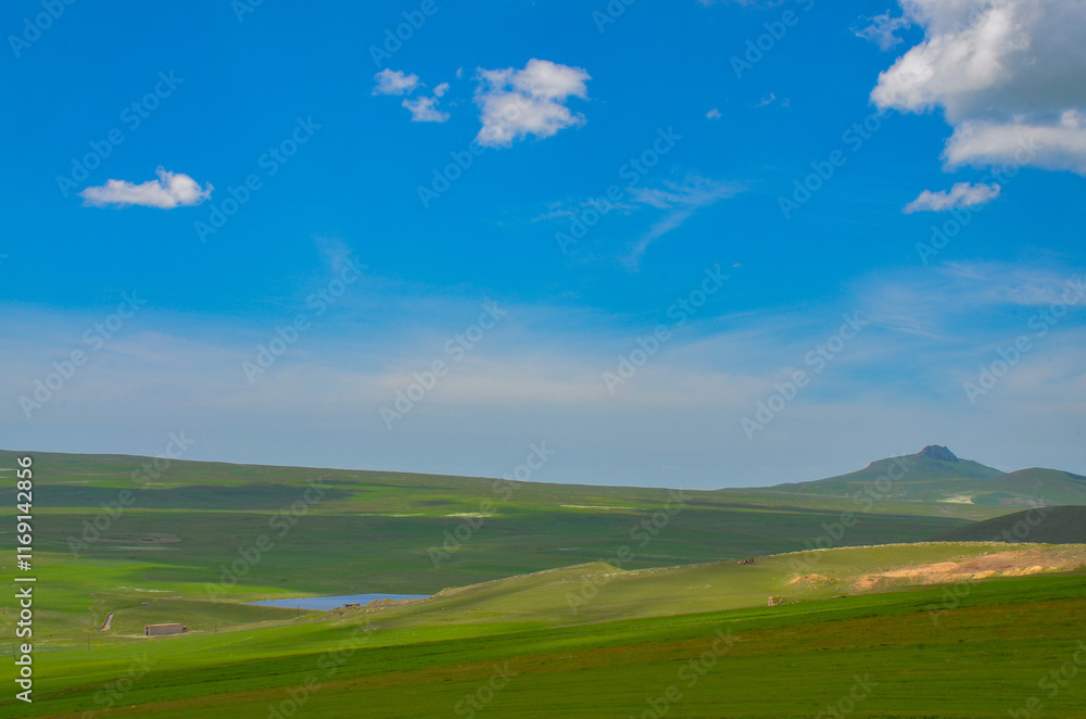 Miro Lake, Mount Harsnakar and alpine valley between Mount Aragats and Pambak Mountain range scenic view from Spitak pass (Tsilkar, Armenia) Miro Lake, Mount Harsnakar and alpine valley between Mount Aragats and Pambak Mountain range scenic view from Spitak pass (Tsilkar, Armenia)
