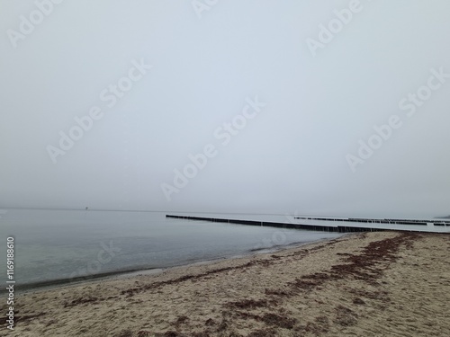 Blick auf die Ostsee mit Wasser (vom Geisterwald aus, mit mystischem und schönen Himmel) in Nienhagen, Mecklenburg - Vorpommern photo