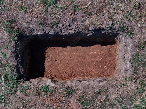 Top view of an empty grave