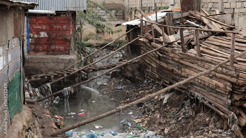 Filthy, diseased water running past the Kibera slum in Kenya.