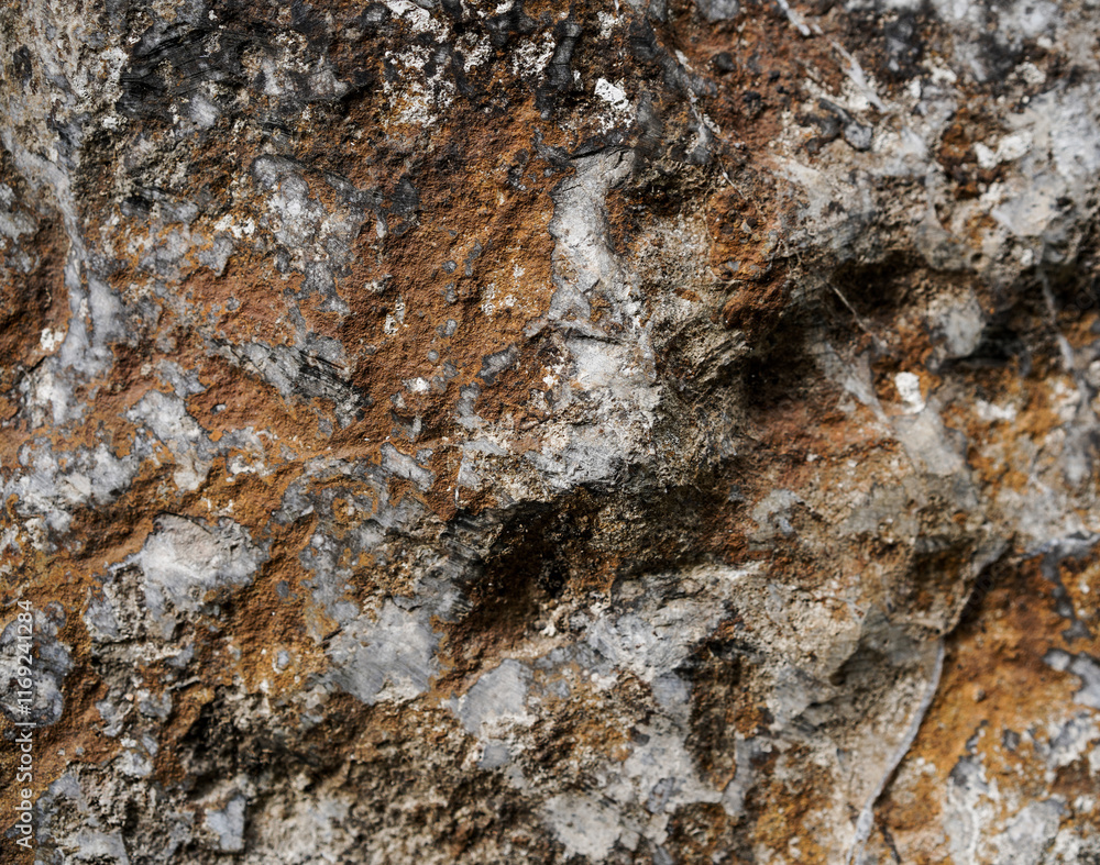 Empty rough brown and grey natural stone wall on cave for abstract background and texture. beautiful patterns, space for work, banner, seamless wallpaper close up. Empty rough brown and grey natural stone wall on cave for abstract background and texture. beautiful patterns, space for work, banner, seamless wallpaper close up.