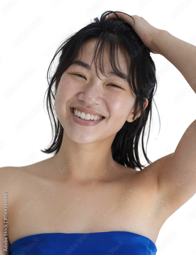 A smiling Asian woman with wet hair, wearing a blue strapless top, poses against a white background. A smiling Asian woman with wet hair, wearing a blue strapless top, poses against a white background.