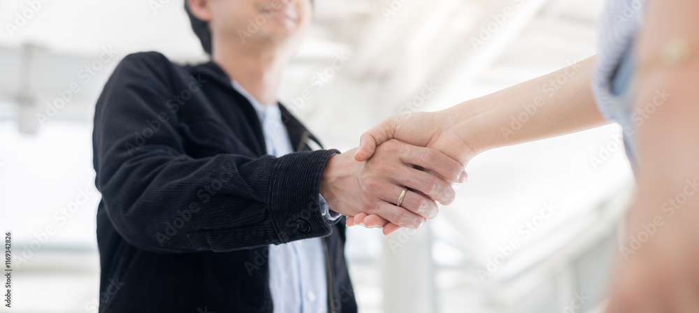 close up investor businessman handshake with partner vendor,collaboration of two ceo leader hand shake for agreement or deal financial cooperative concept. close up investor businessman handshake with partner vendor,collaboration of two ceo leader hand shake for agreement or deal financial cooperative concept.