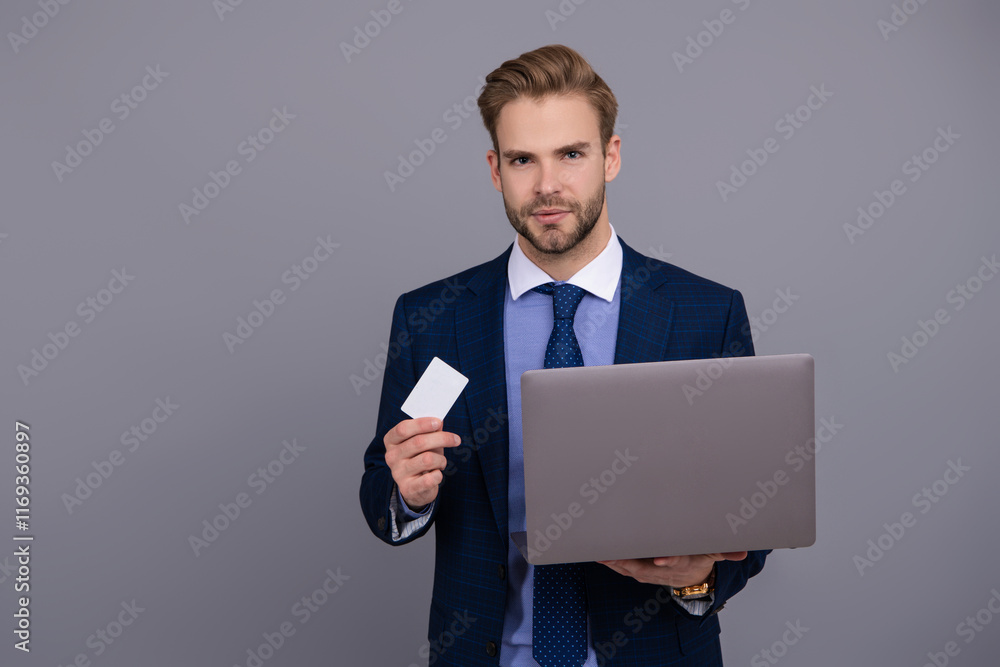 Businessman showing business card. Fast pc payment. Shopping on cyber Monday. Agile business. Network administrator hold laptop. Man pay in online banking. Credit or debit card. Copy space Businessman showing business card. Fast pc payment. Shopping on cyber Monday. Agile business. Network administrator hold laptop. Man pay in online banking. Credit or debit card. Copy space