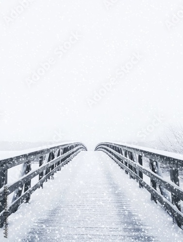 Snow covered wooden bridge ...