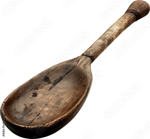 A rustic wooden spoon with a smooth, curved bowl and a long handle, showcasing wear and unique grain patterns. photo