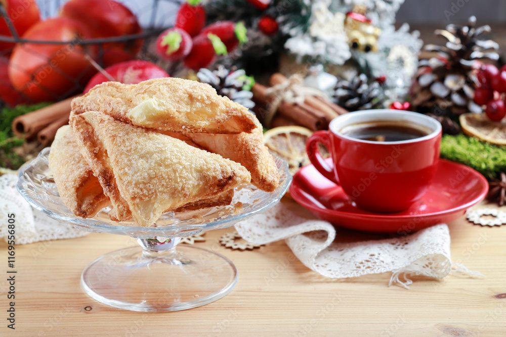 Traditional french cookies with cheese filling and cup of coffee.