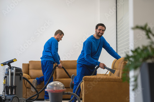 The cleaning team cleans the sofa