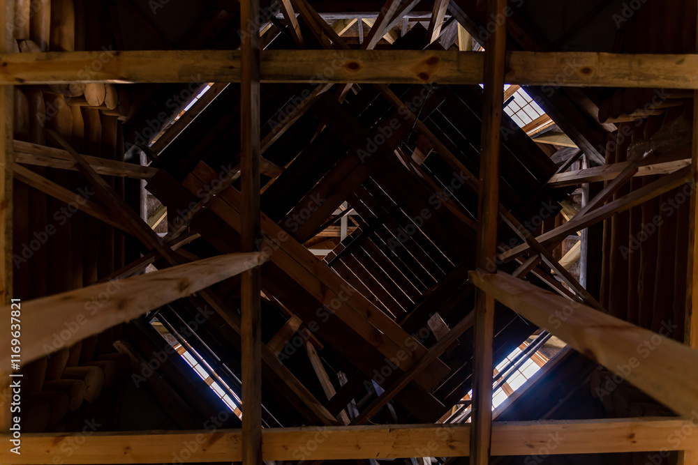 Intricate Wooden Roof Framework with Central Square Opening Intricate Wooden Roof Framework with Central Square Opening