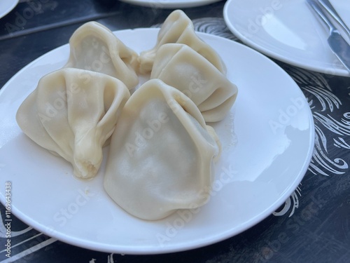 Obraz na plátně Traditional georgian khinkali in one of Tbilisi restaurants