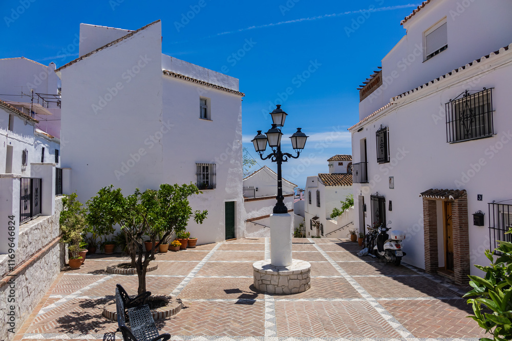 Unique white painted village of Mijas (not far from Malaga) - Spanish hill town overlooking the Costa del Sol. Wonderful decoration of the houses in Mijas. Mijas, Andalusia, Spain.