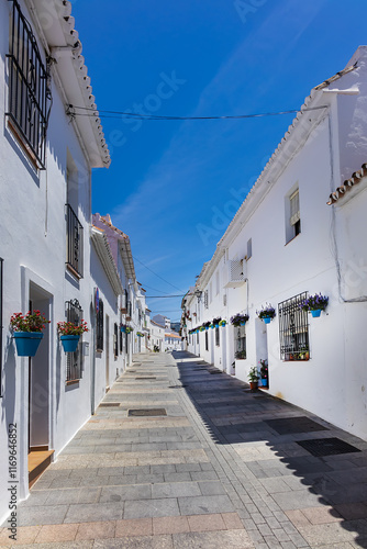 Unique white painted village of Mijas (not far from Malaga) - Spanish hill town overlooking the Costa del Sol. Wonderful decoration of the houses in Mijas. Mijas, Andalusia, Spain.