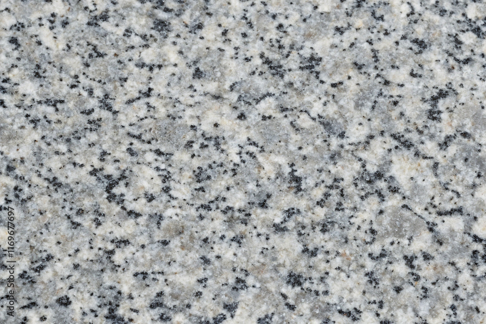 Seamless, highly detailed natural granite texture with flecks. Seamless, highly detailed natural granite texture with flecks.