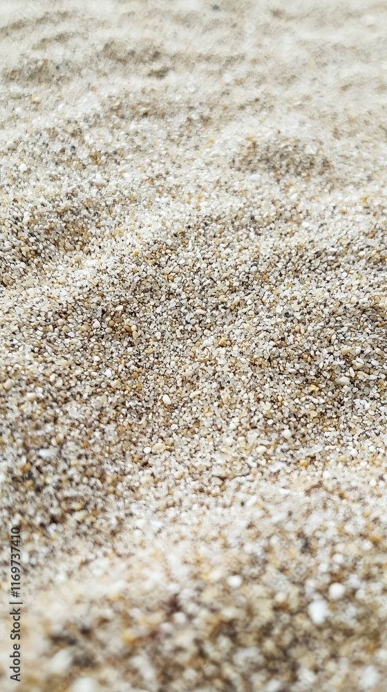 Close-Up View of Fine Sand Textures on the Beach Shoreline Close-Up View of Fine Sand Textures on the Beach Shoreline