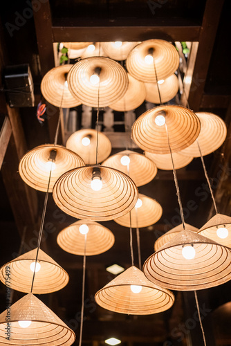 Straw Hat Chandelier in Hoi An Ancient City of Vietnam photo