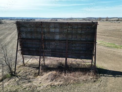 Backside of an old billboard along a Canadian highway - Face arrière d'un vieux panneaux de publicité le long d'une autoroute canadienne photo