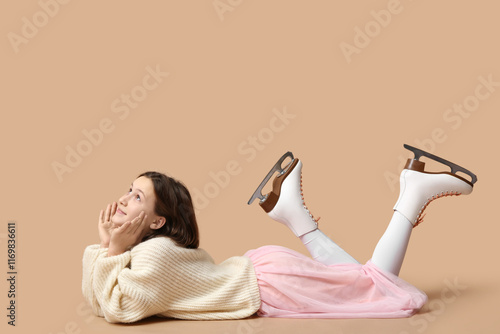 Cute little girl in ice ska...