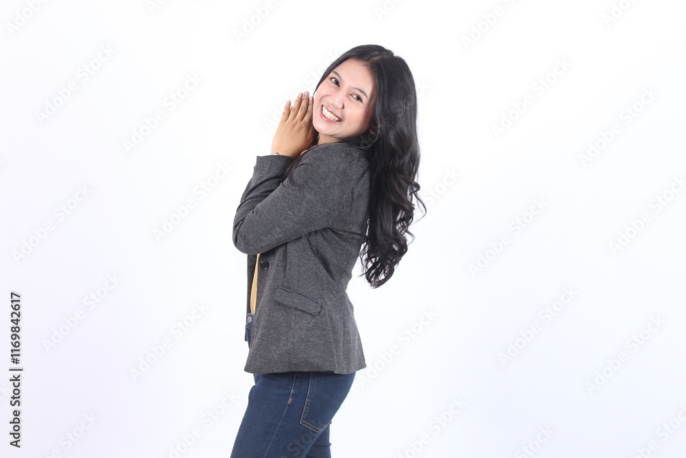 business woman gripping both hands under the chin looking at camera business woman gripping both hands under the chin looking at camera