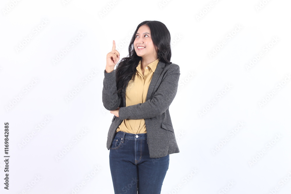 young Asian business woman in blazer pointing finger up young Asian business woman in blazer pointing finger up