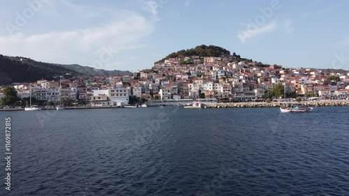 Plomari town on the island of Lesbos, Fishing boat in Aegeon sea, Establishing shot, Aerial view photo