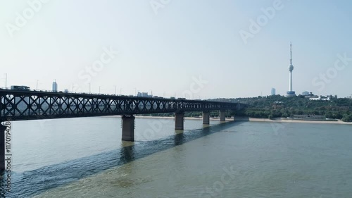 Wallpaper Mural An aerial view of the Wuhan Yangtze River Bridge with a steady flow of cars traversing its length Torontodigital.ca