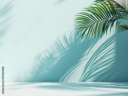 minimalist concept with palm leaves casting shadows on a blue wall and pastel floor, creating a summer tropical beach background in an empty room ideal for product placement