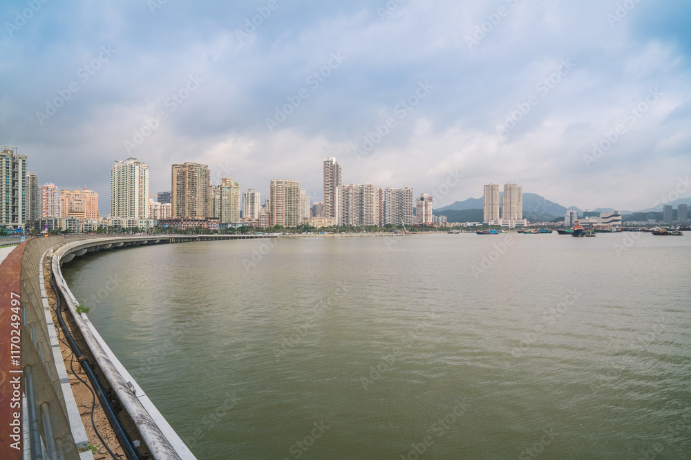 Modern urban architecture skyline and coastal scenery in Zhuhai, Guangdong Province, China on April 9, 2023 Modern urban architecture skyline and coastal scenery in Zhuhai, Guangdong Province, China on April 9, 2023