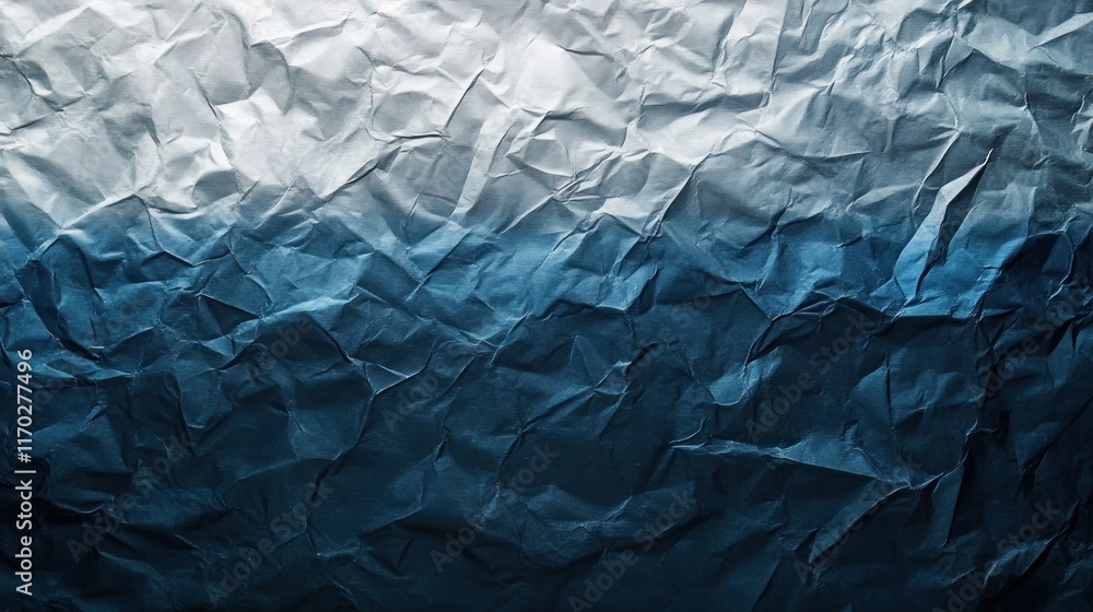 Fototapeta premium Abstract crumpled paper texture with gradient blue and white color.
